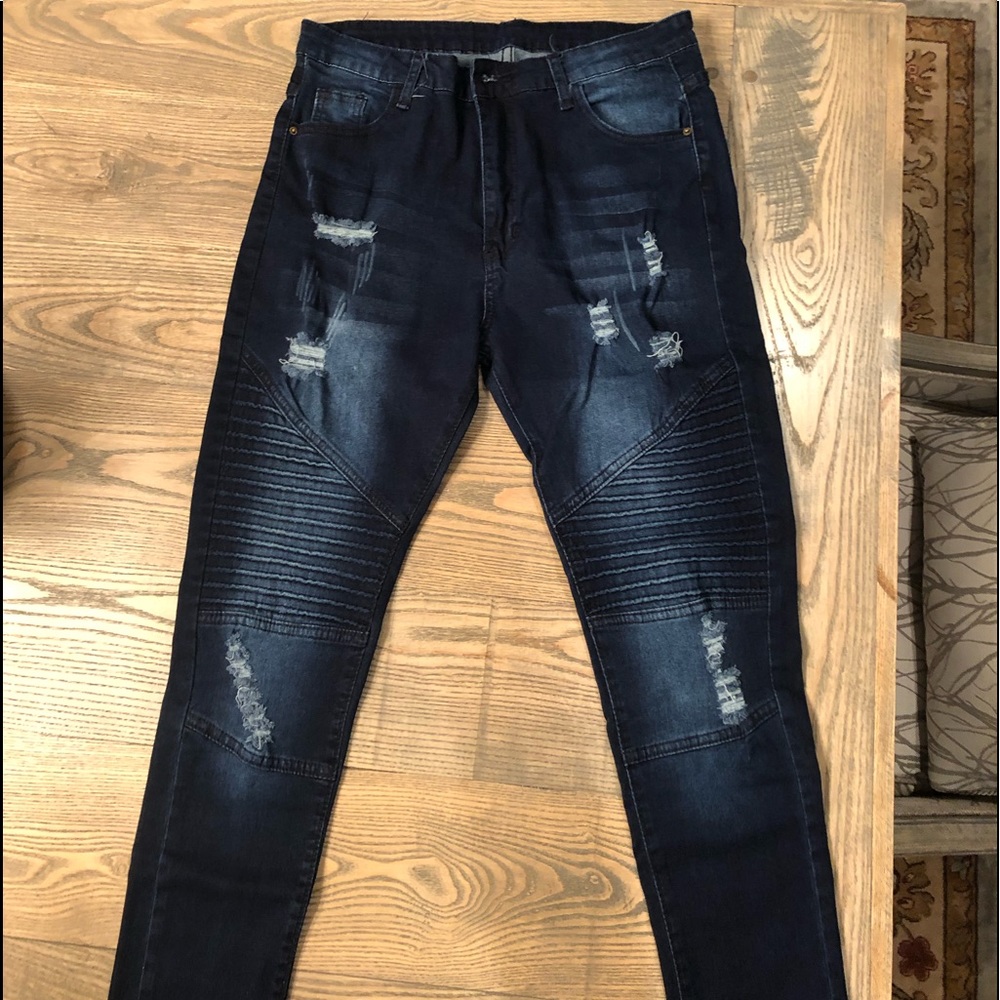 Brand new dark blue stretchy jeans.